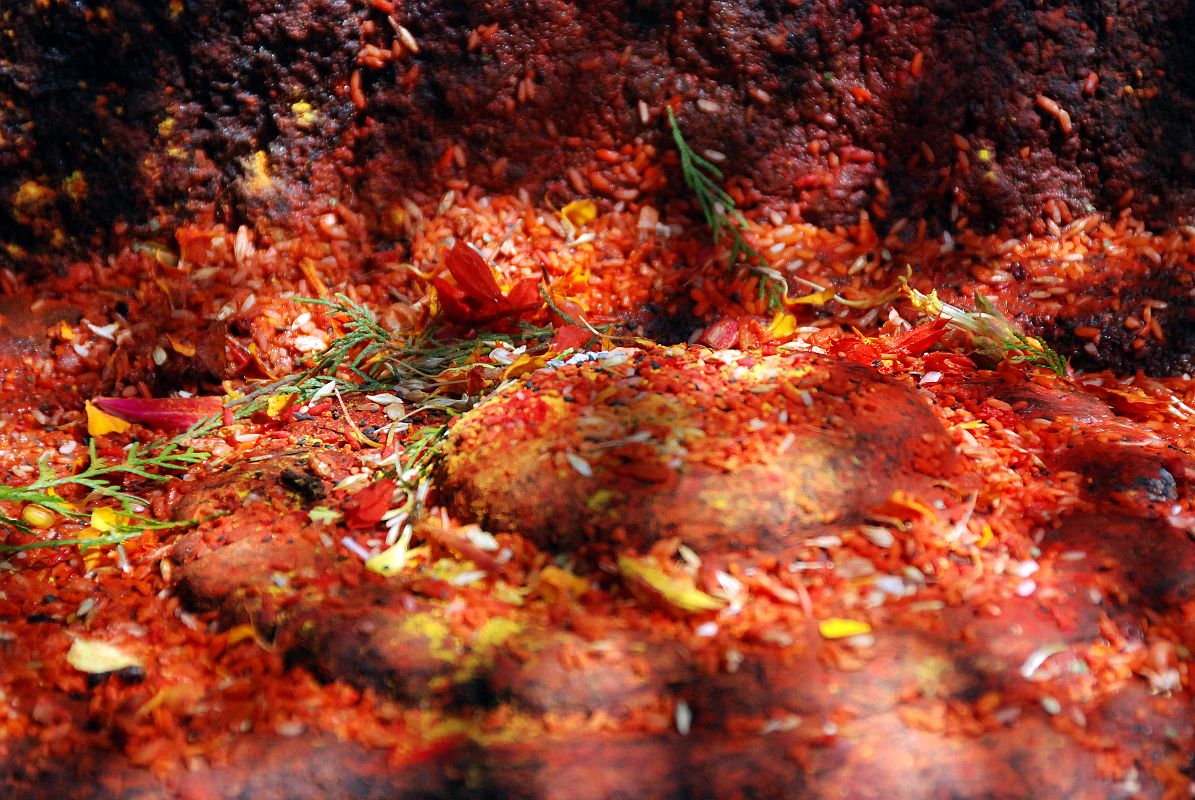 06 Kathmandu Valley Sankhu Vajrayogini Bhairav Triangular Stone Colours Close Up 
